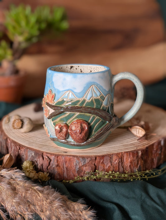 Owls on a Branch in the Mountains Mug